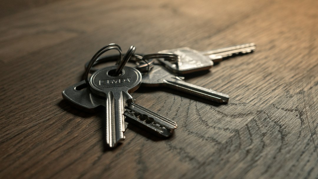 House keys resting on a wooden table